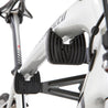 Close up of bike storage system cradle arm holding a bike on white in studio.
