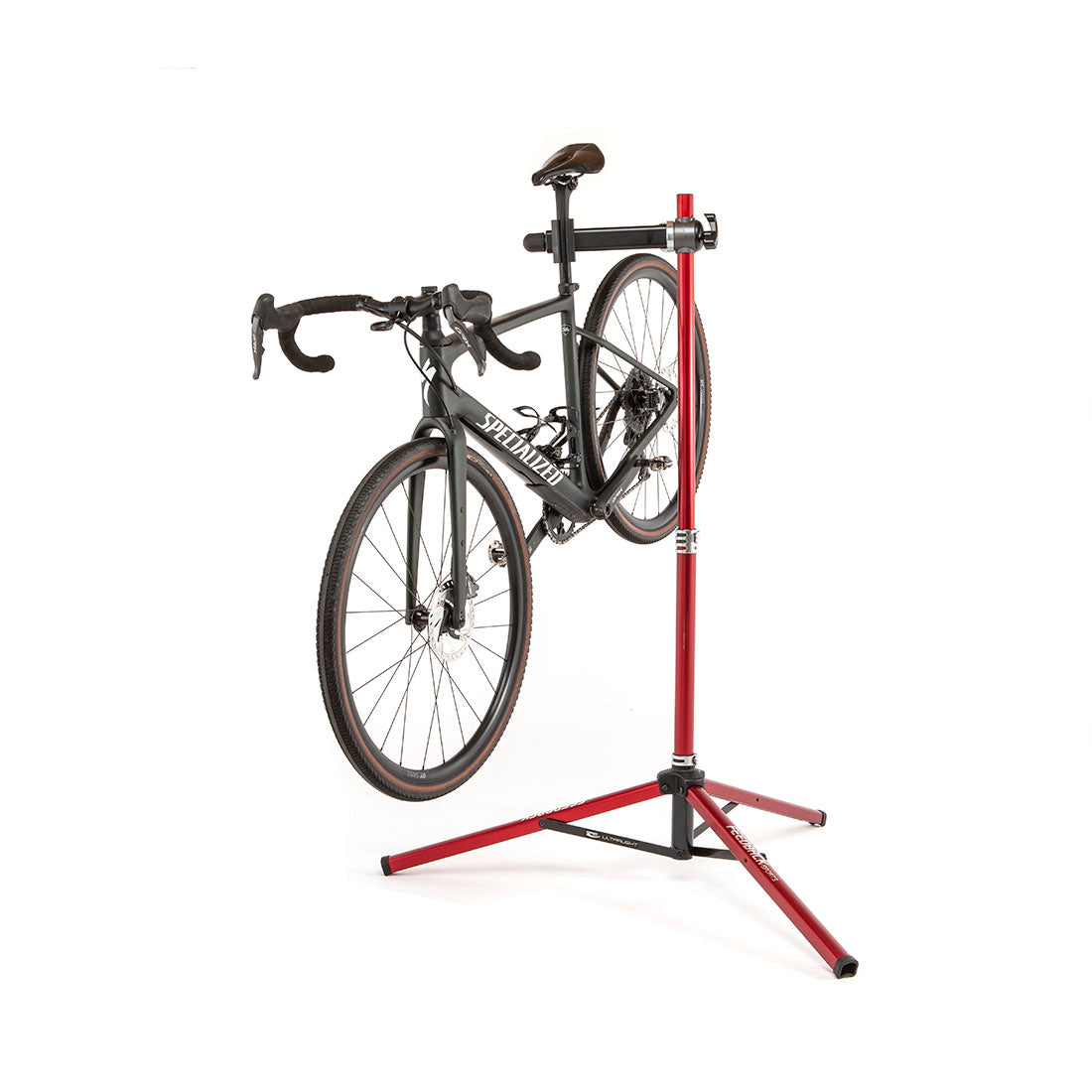 Feedback Sports ultralight bike repair stand in studio on white with bike installed.
