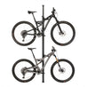 Feedback Sports Velo Column bike storage stand with two mountain bikes on white background.