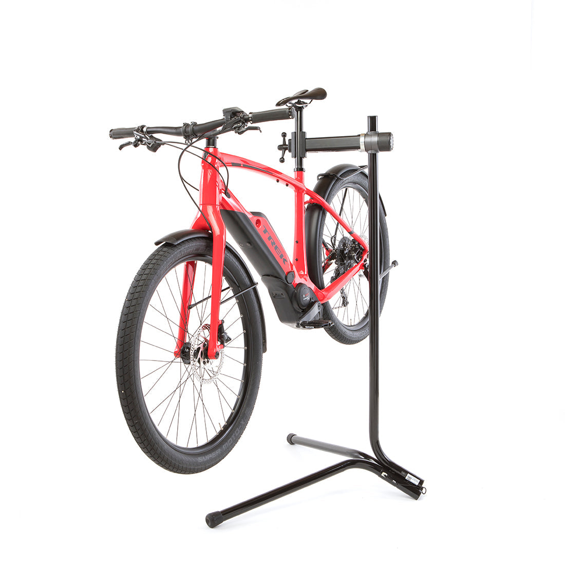 Feedback Sports Recreational bike repair stand with urban bike mounted on white background.
