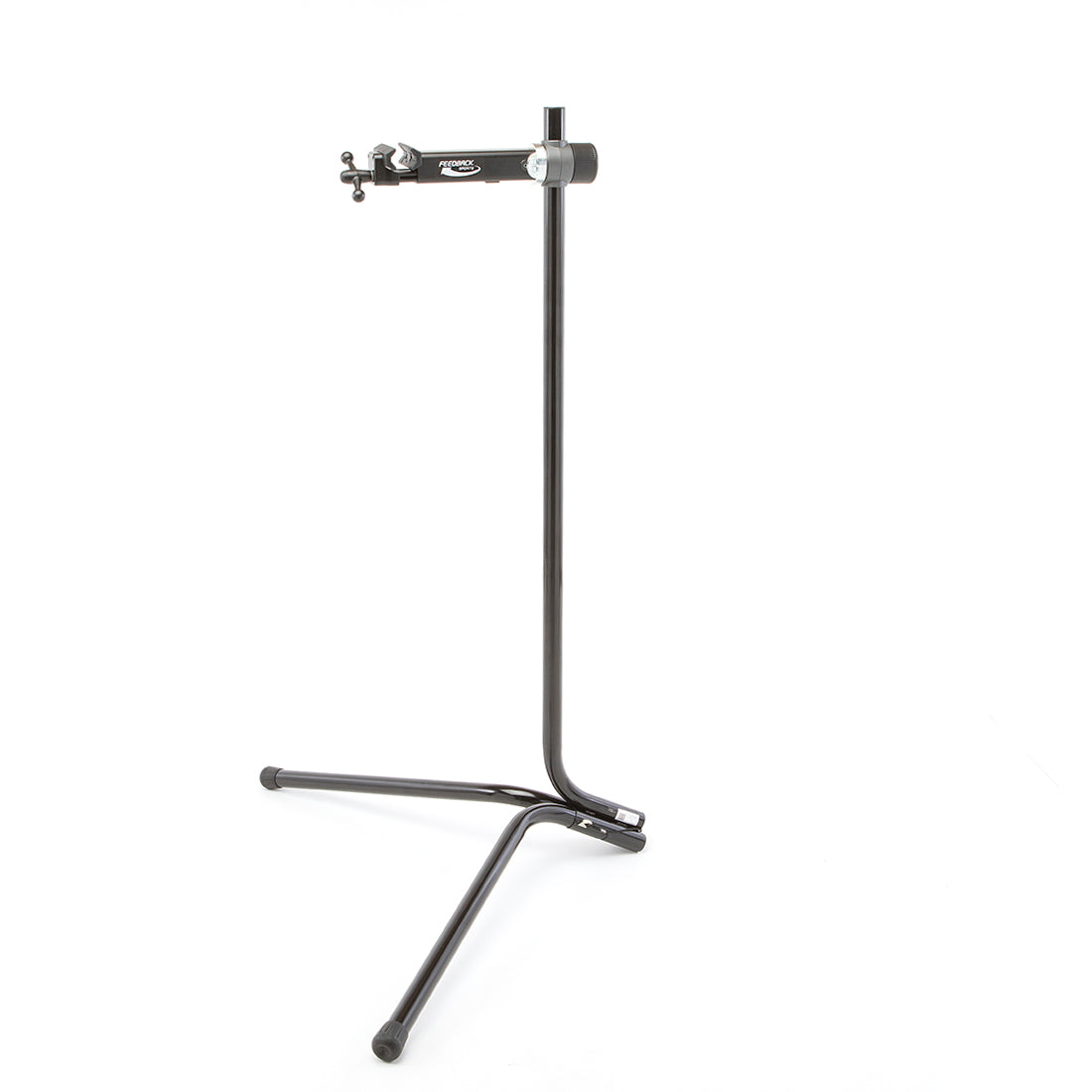 Feedback Sports recreational bike repair stand deployed for use on white.