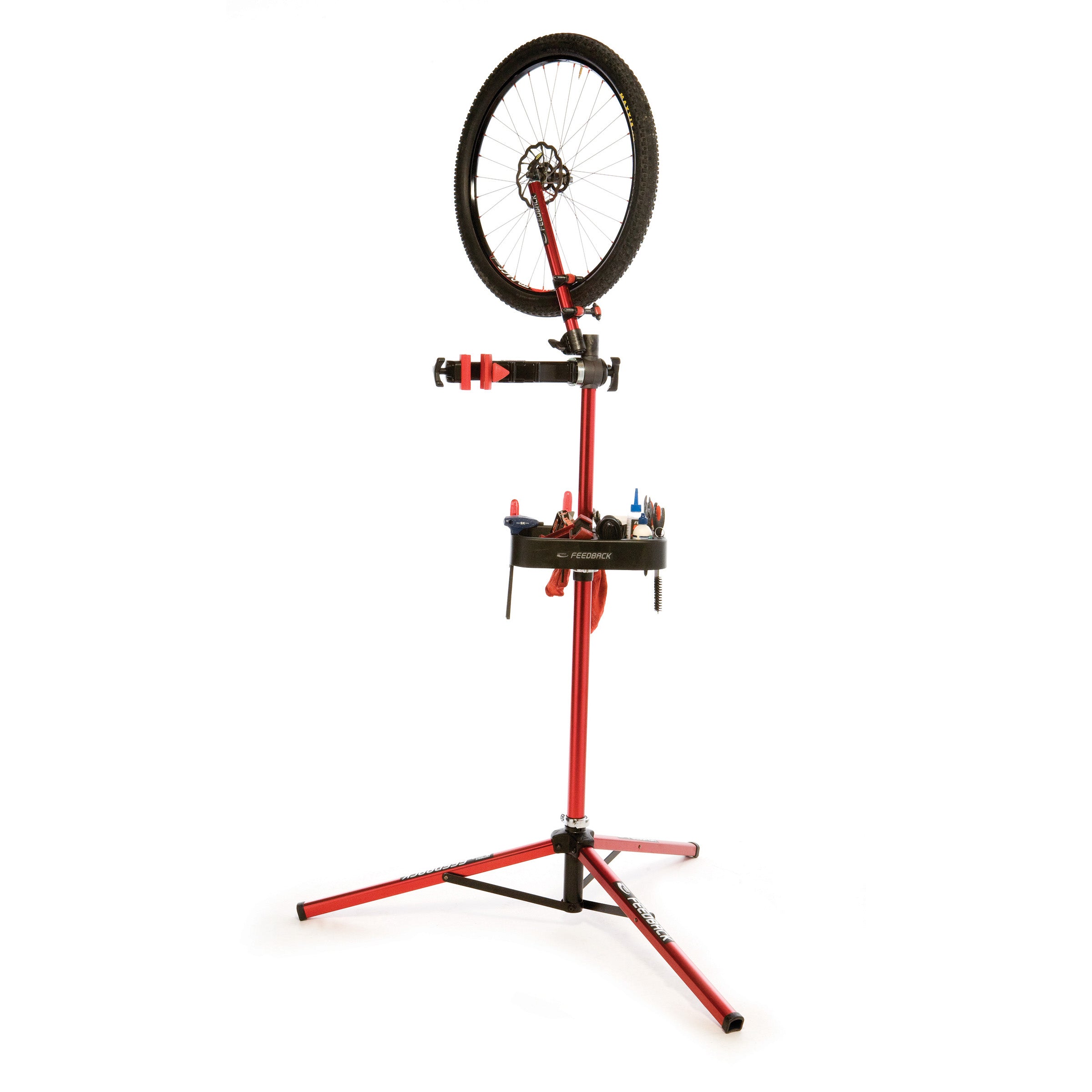 Pro Truing stand mounted on top of a feedback sports repair stand